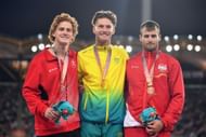 Shawn Barber with athletes Kurtis Marschall and Luke Cutts at Commonwealth Games Day 8